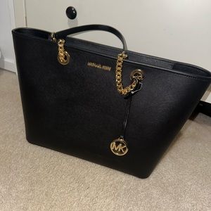 Michael Kors black bag new with tag never used